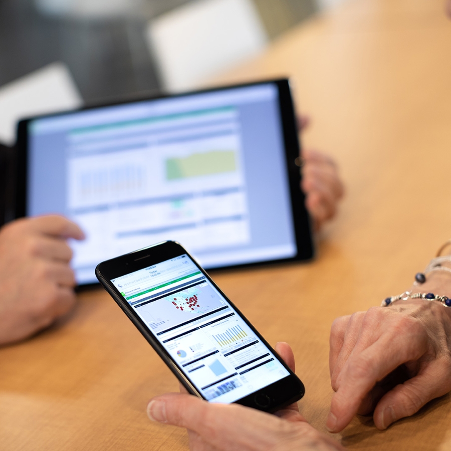 People using mobiles and tablets